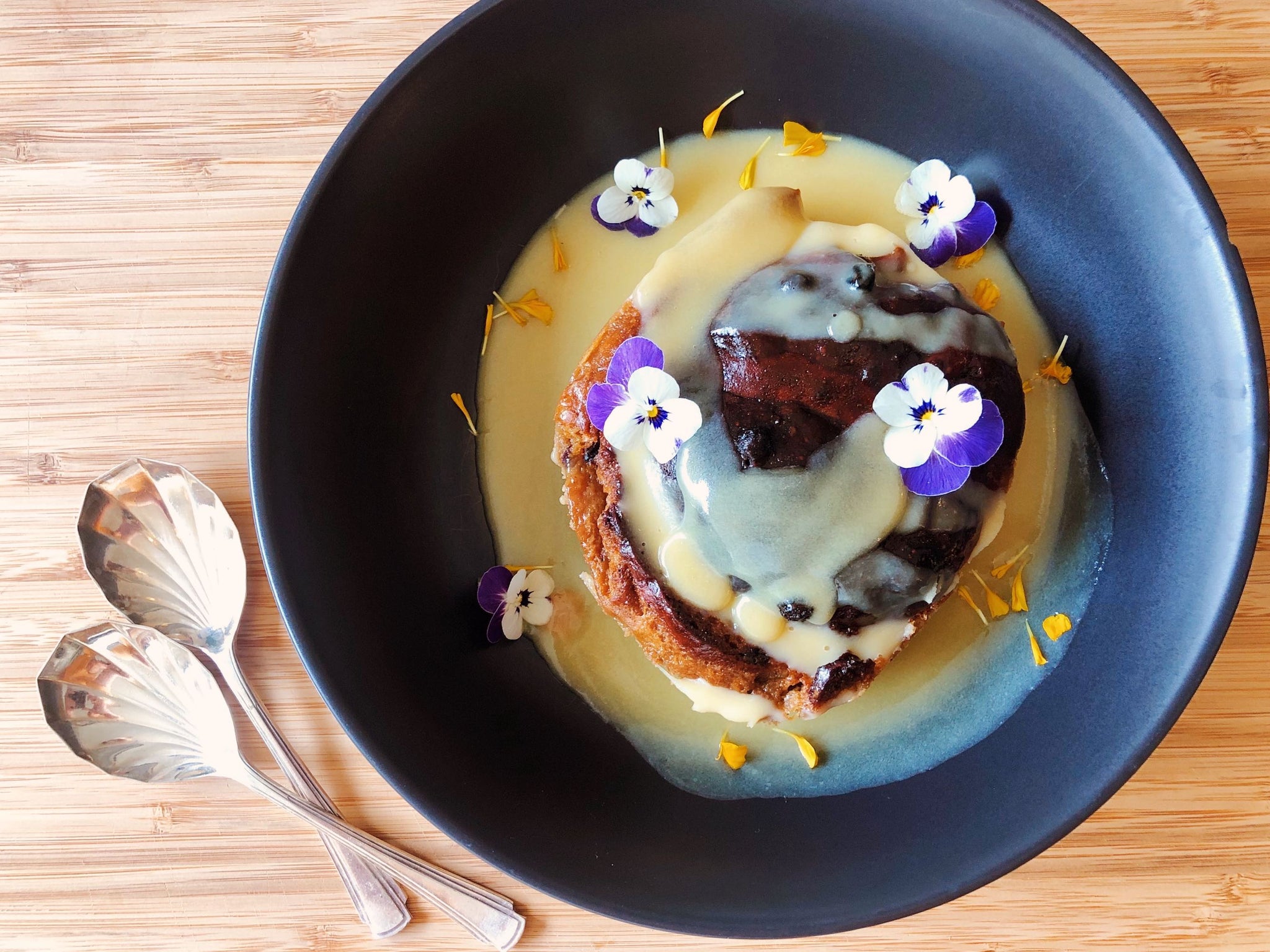 CHAI-INFUSED EASTER PUDDING WITH WHITE CHOCOLATE MAPLE SAUCE